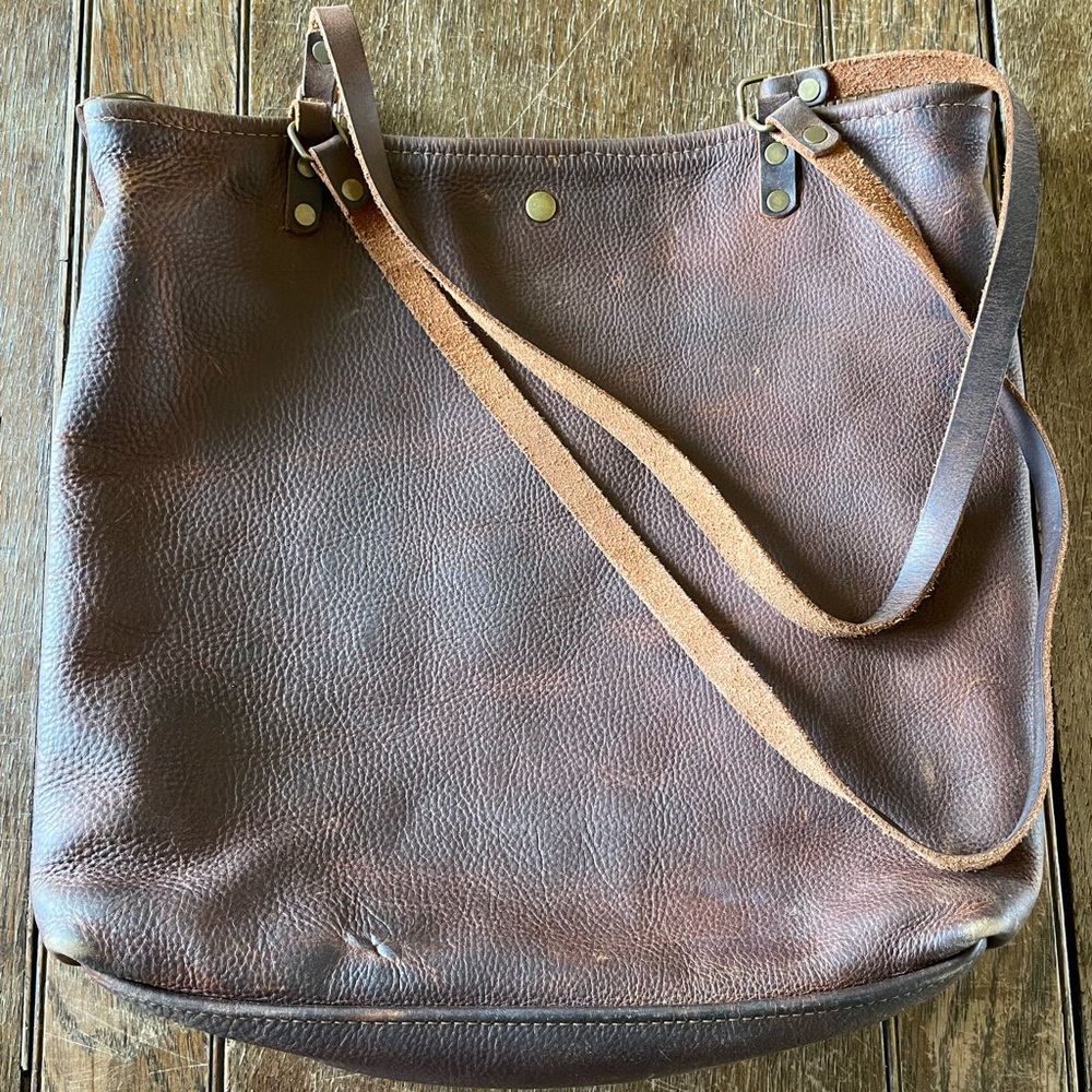 In Blue Leather Bag
